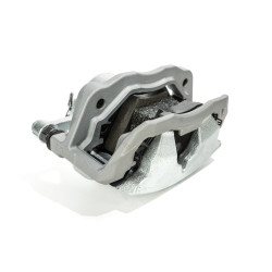 Zacisk hamulcowy lewy +...